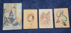 Lenormand cards including ring, fox, key and oracle card