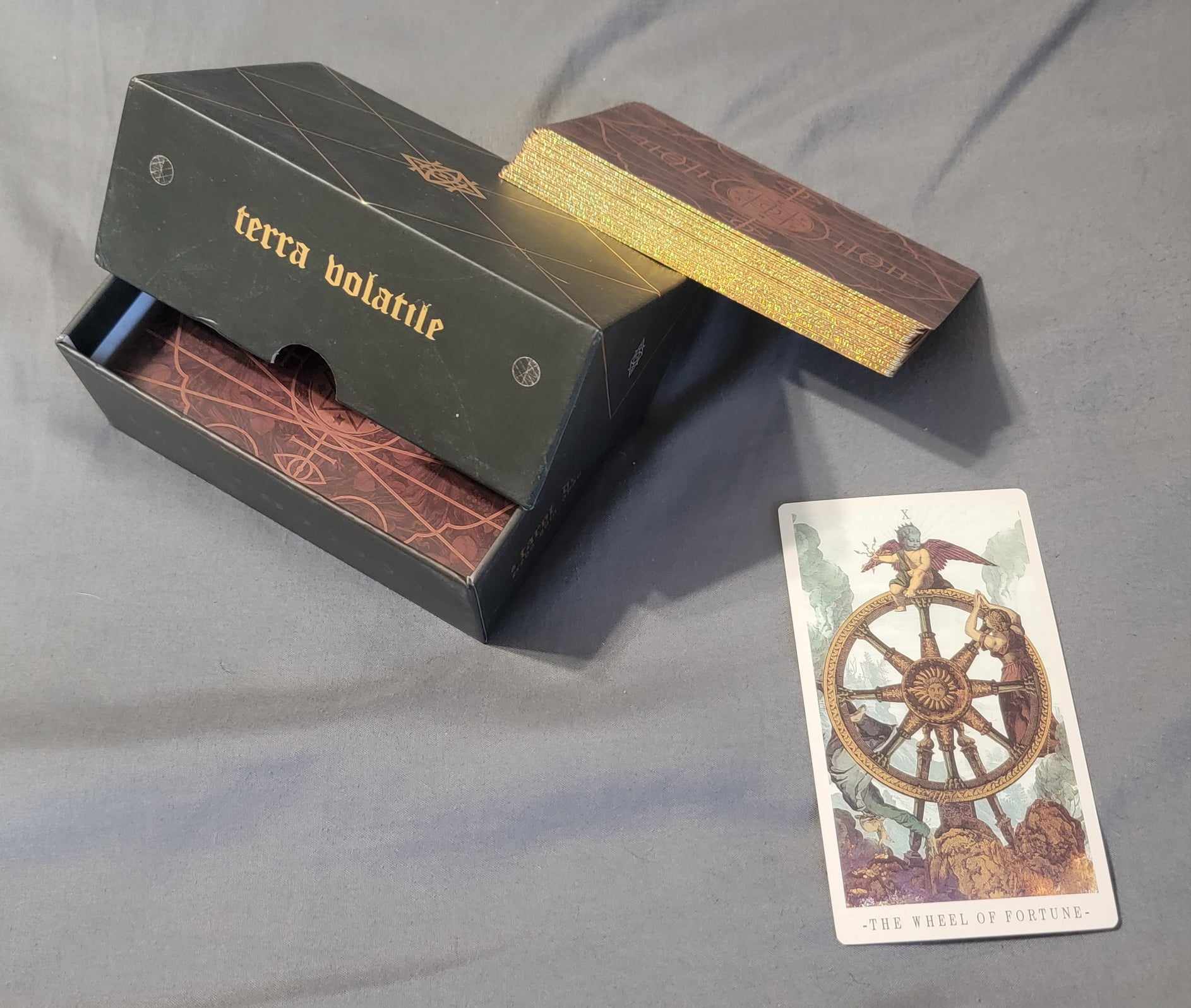 A reprint of the famous Terra Volatile tarot deck purchased from Temu